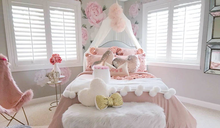 Plantation shutters in a girls bedroom