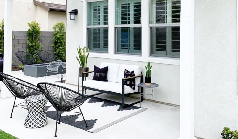 Spending a little time weeding and mulching can help give you a backyard oasis. An outdoor with plantation shutters