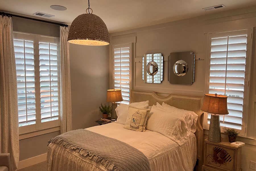 White Polywood shutters in an elegant bedroom