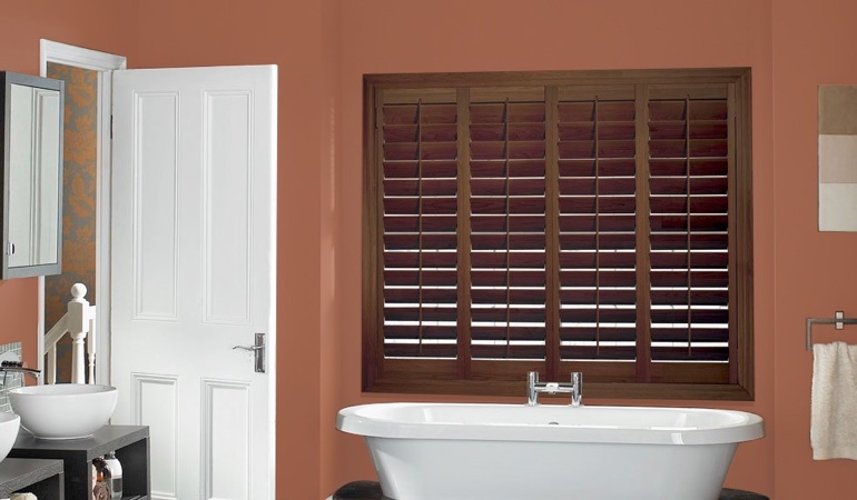 Put old paint to good use and give your living space a fresh look. Plantation window treatments in a bathroom